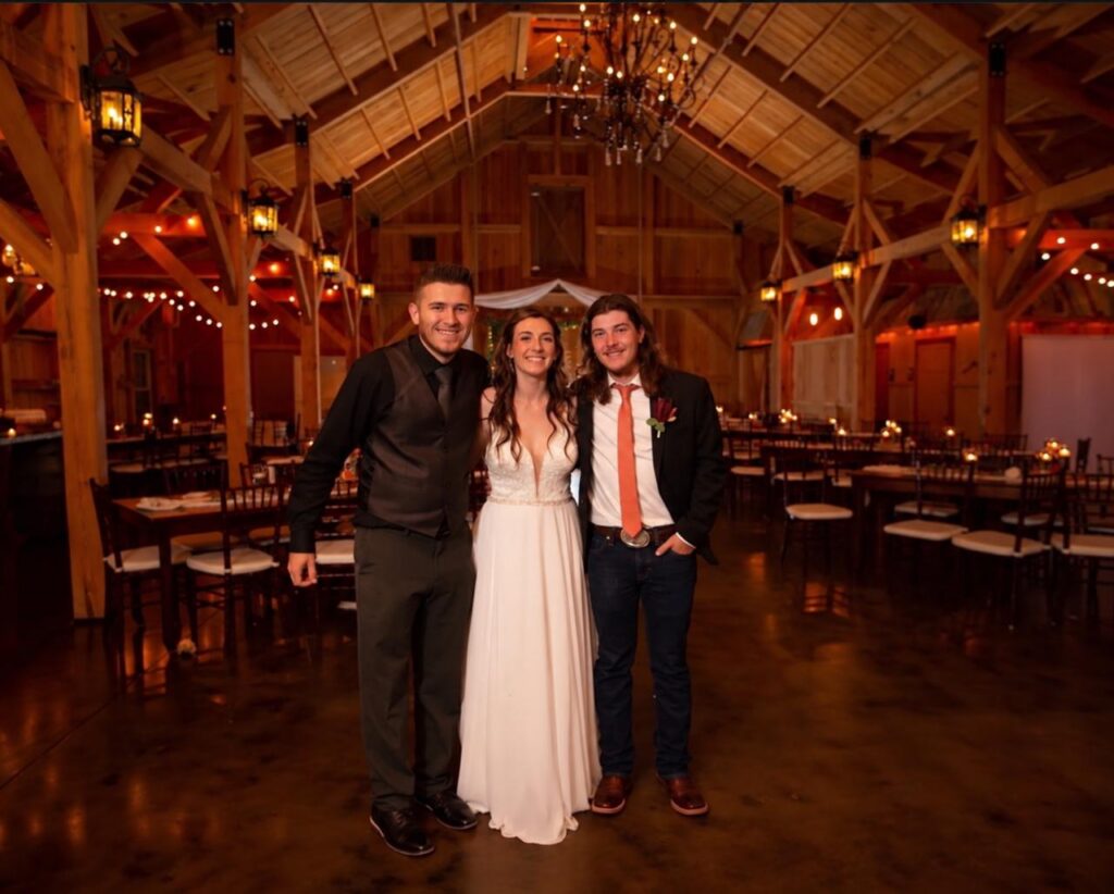 Curits with bride and groom