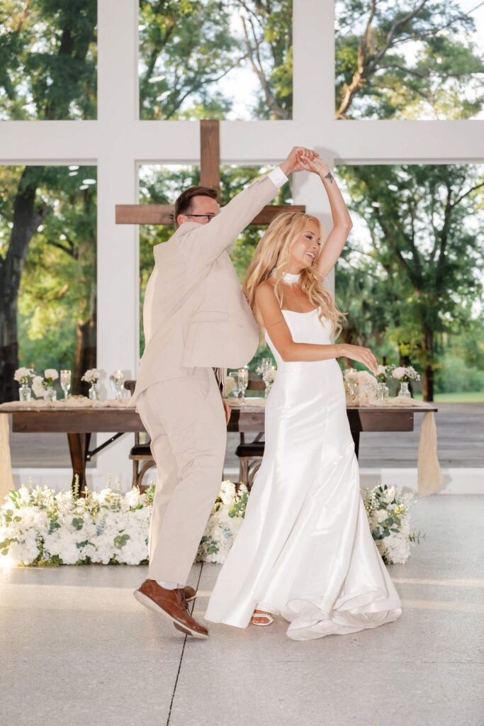 Hannah and Michael performing the lift in their coordinated first dance