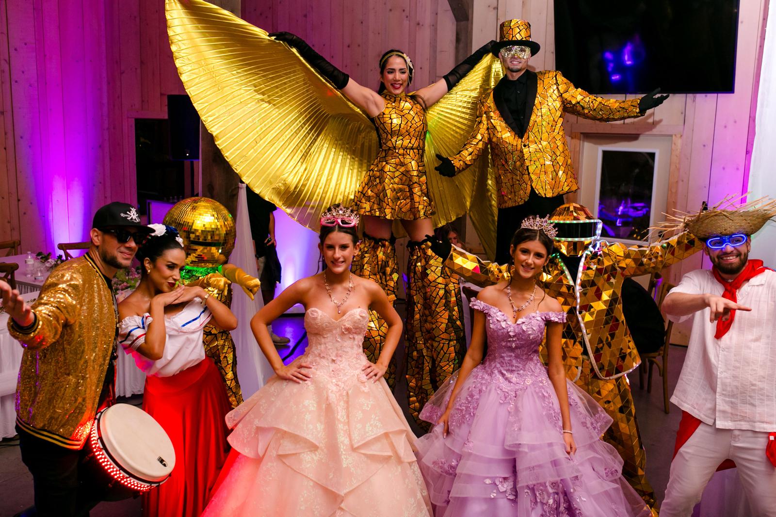 Alaina and London with Hora Loca dancers and drummers at their quinceañera in Lake Mary, Florida.