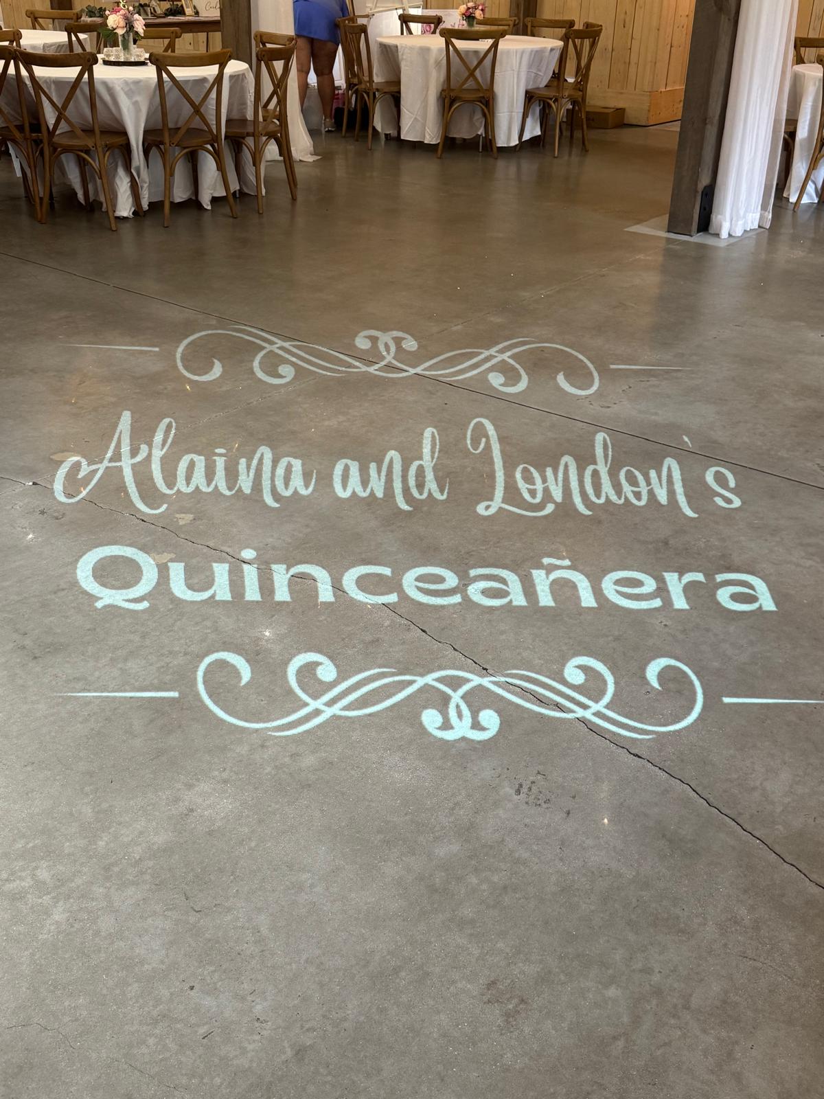 Custom floor monogram reading Alaina and London’s Quinceañera at The Barn at Hidden Oaks Farm.