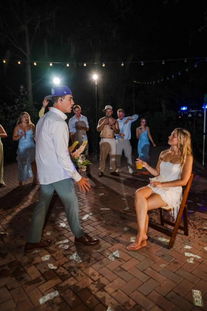 Aaron sings to Emily during their Justin Bieber inspired wedding surprise at Lakeview Gardens.