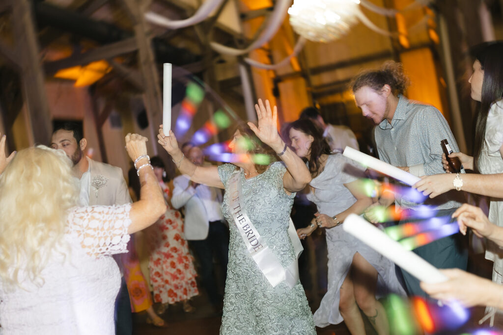 Packed wedding dance floor at The Barn at Hidden Oaks reception