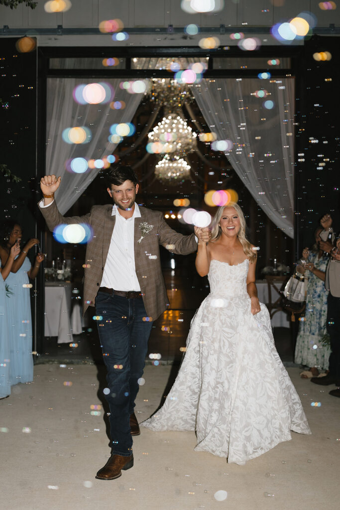 Sierra and Marshall during their wedding send off at The Barn at Hidden Oaks