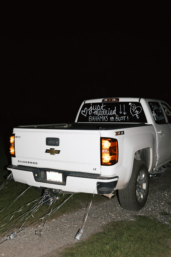 Wedding getaway truck outside The Barn at Hidden Oaks in Lake Mary